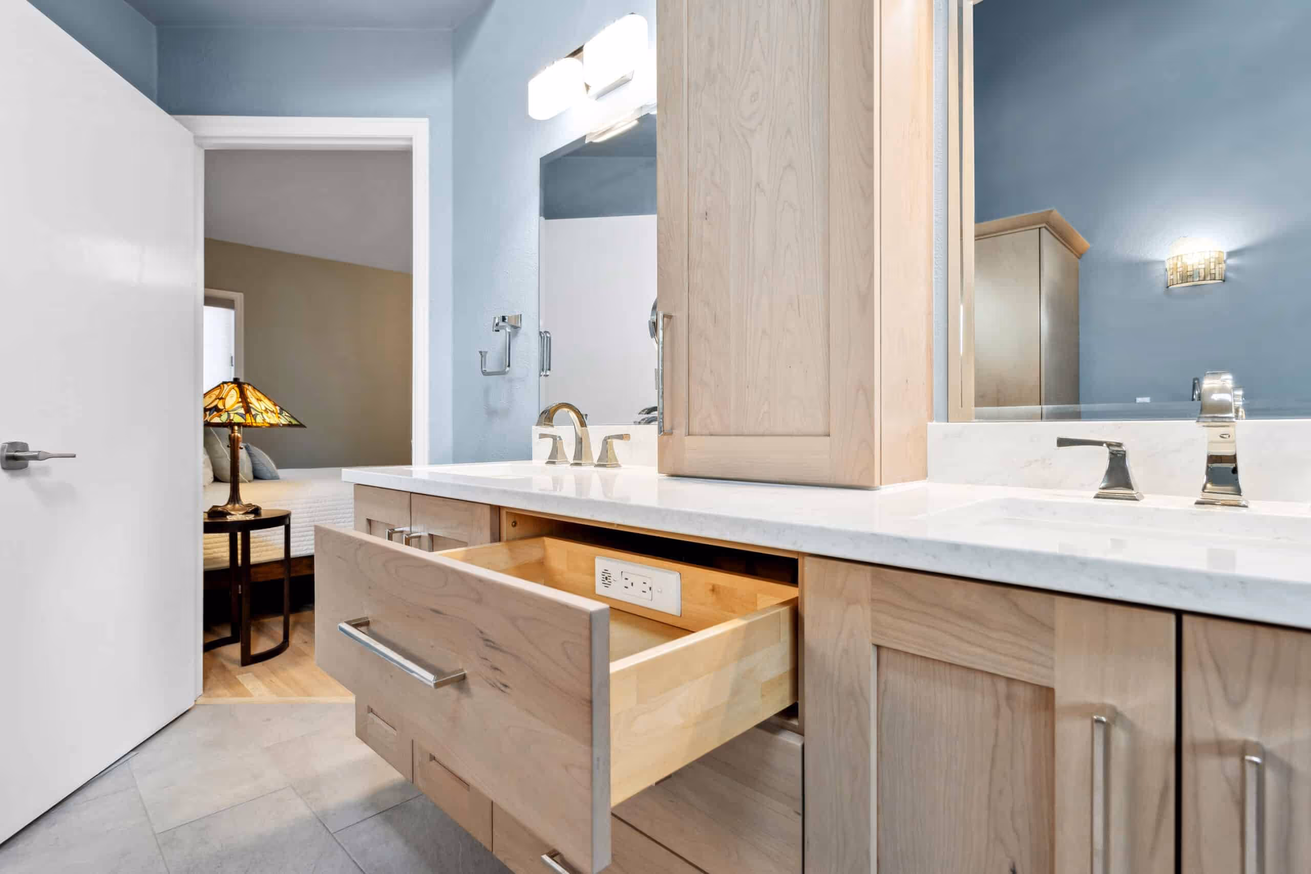 Modern bathroom vanity with clean lines and integrated sink on a floating base.