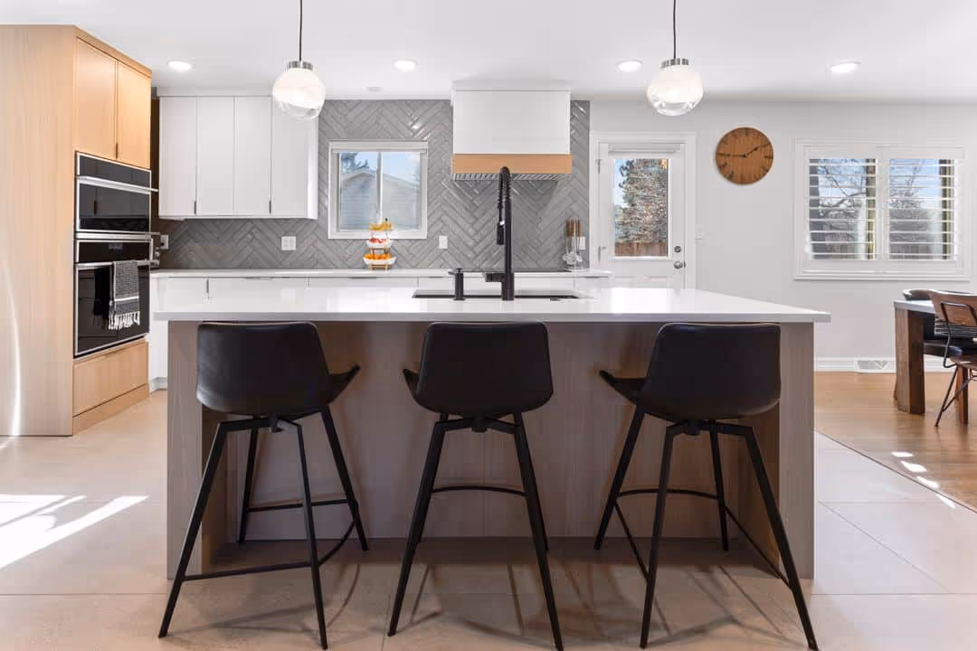 Kitchen with a dark island