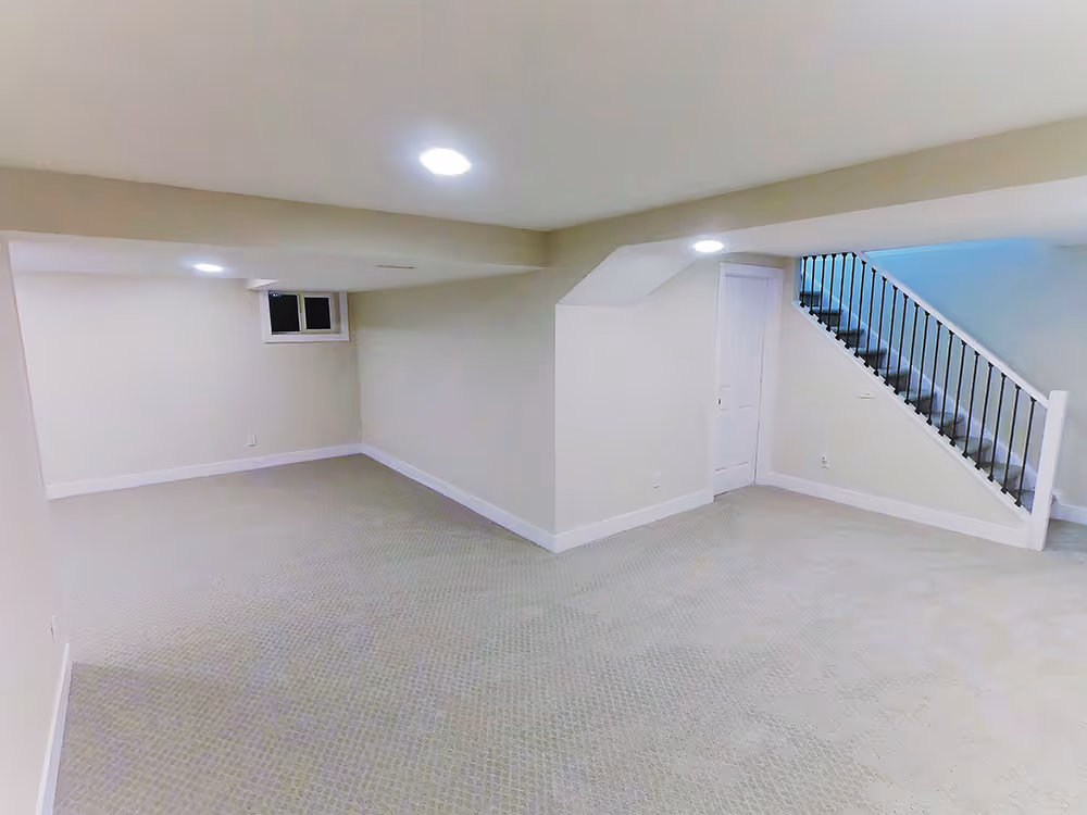 Finished basement with a game area
